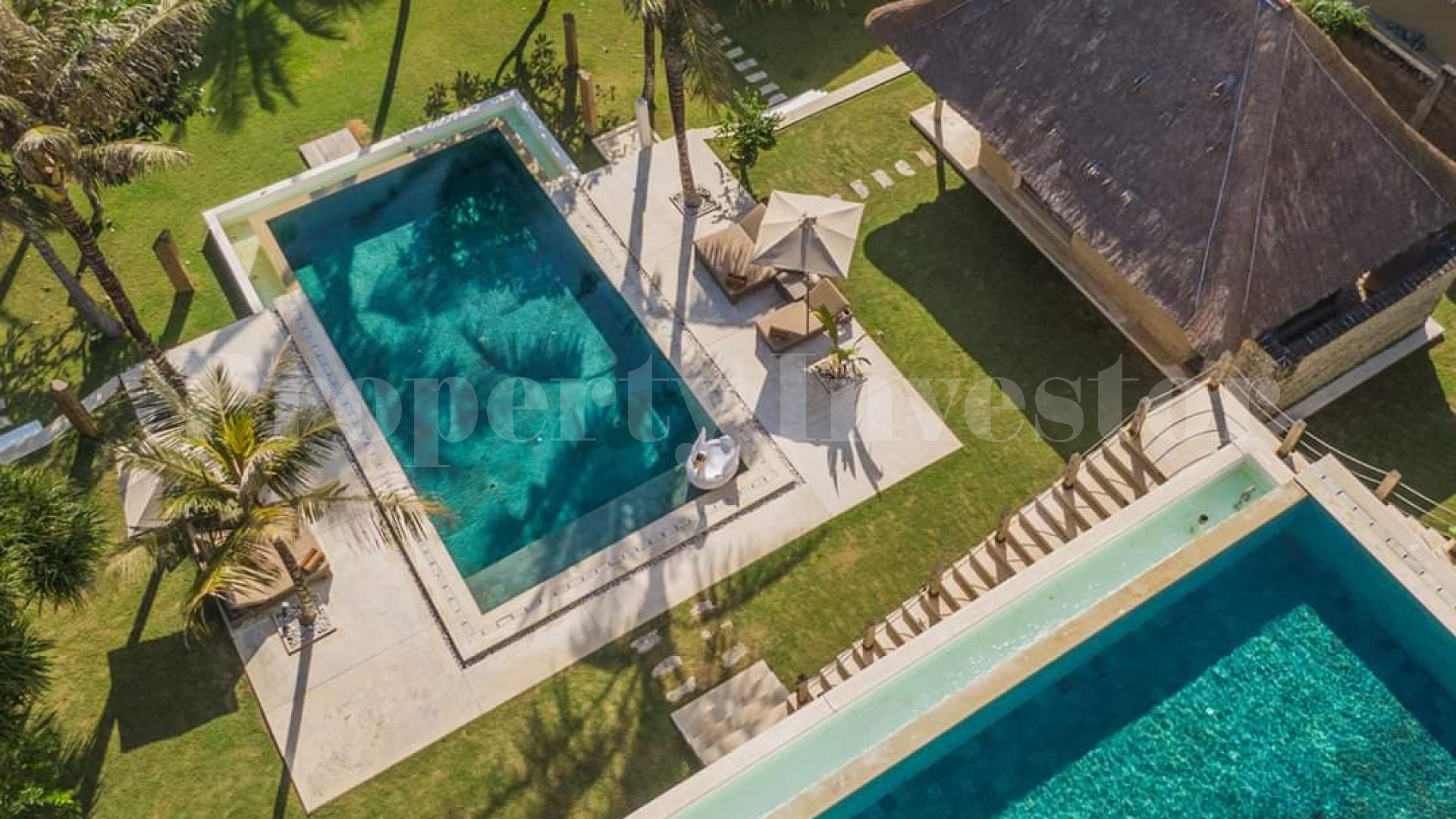 Chic Commercial Beachfront Estate with 4 Luxury Residences (17 Bedrooms) and Spacious Gardens & Pools in Tabanan, Bali