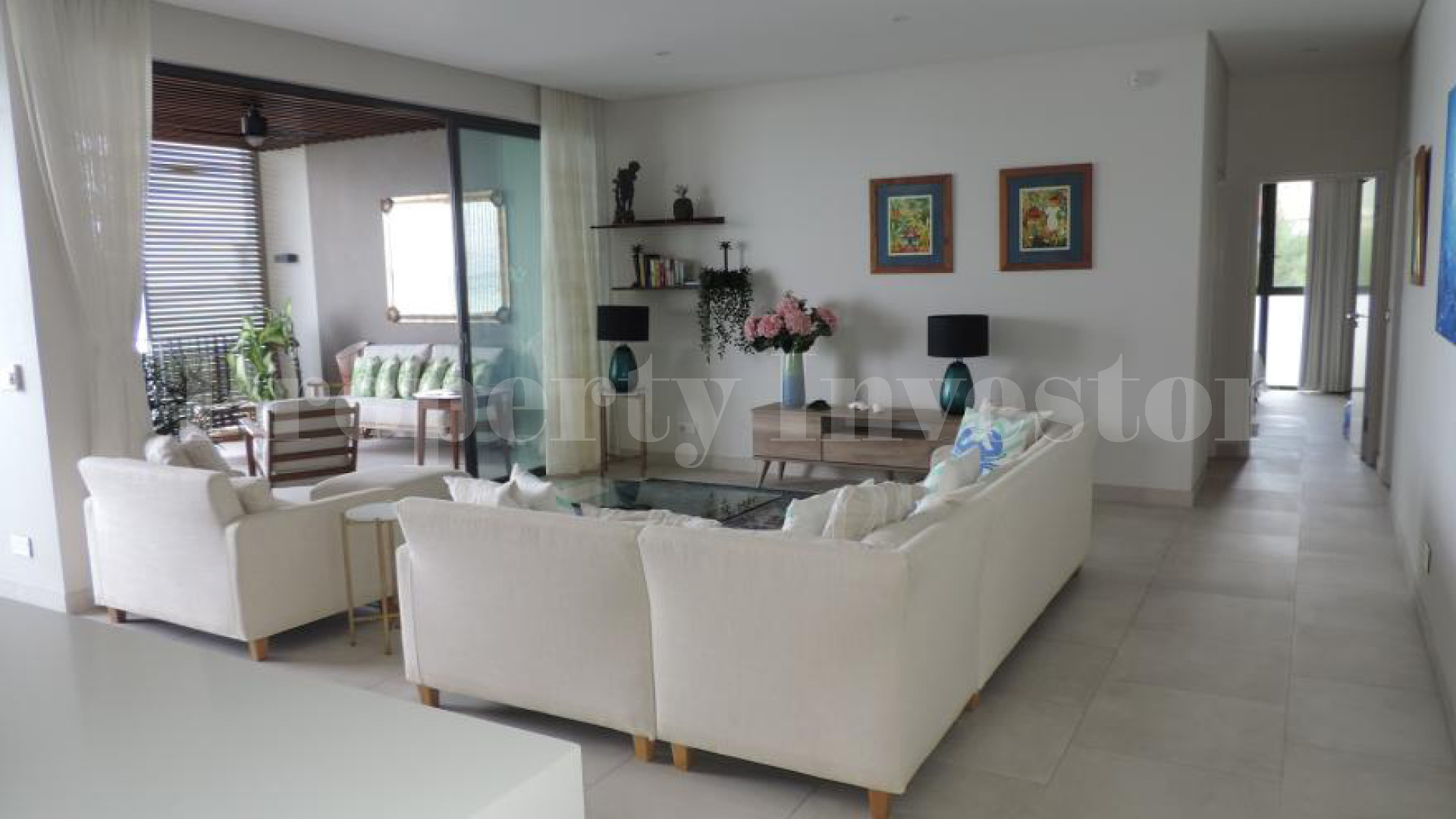 Exclusive 3 Bedroom Luxury Designer Beachfront Apartment with Spectacular Sea Views for Sale in Mahé, Seychelles