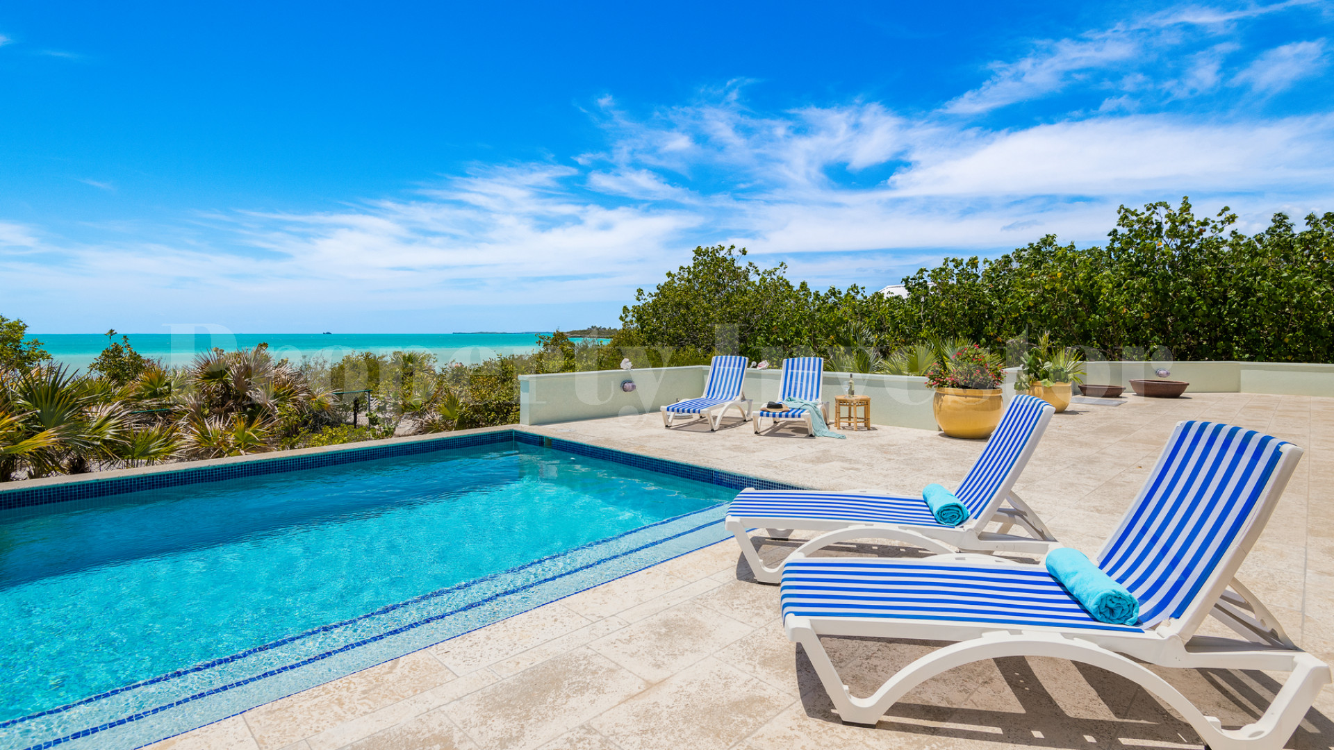 Fantastic 4 Bedroom Cape Cod Style Luxury Beach House for Sale  on Taylor Bay Beach, Turks & Caicos