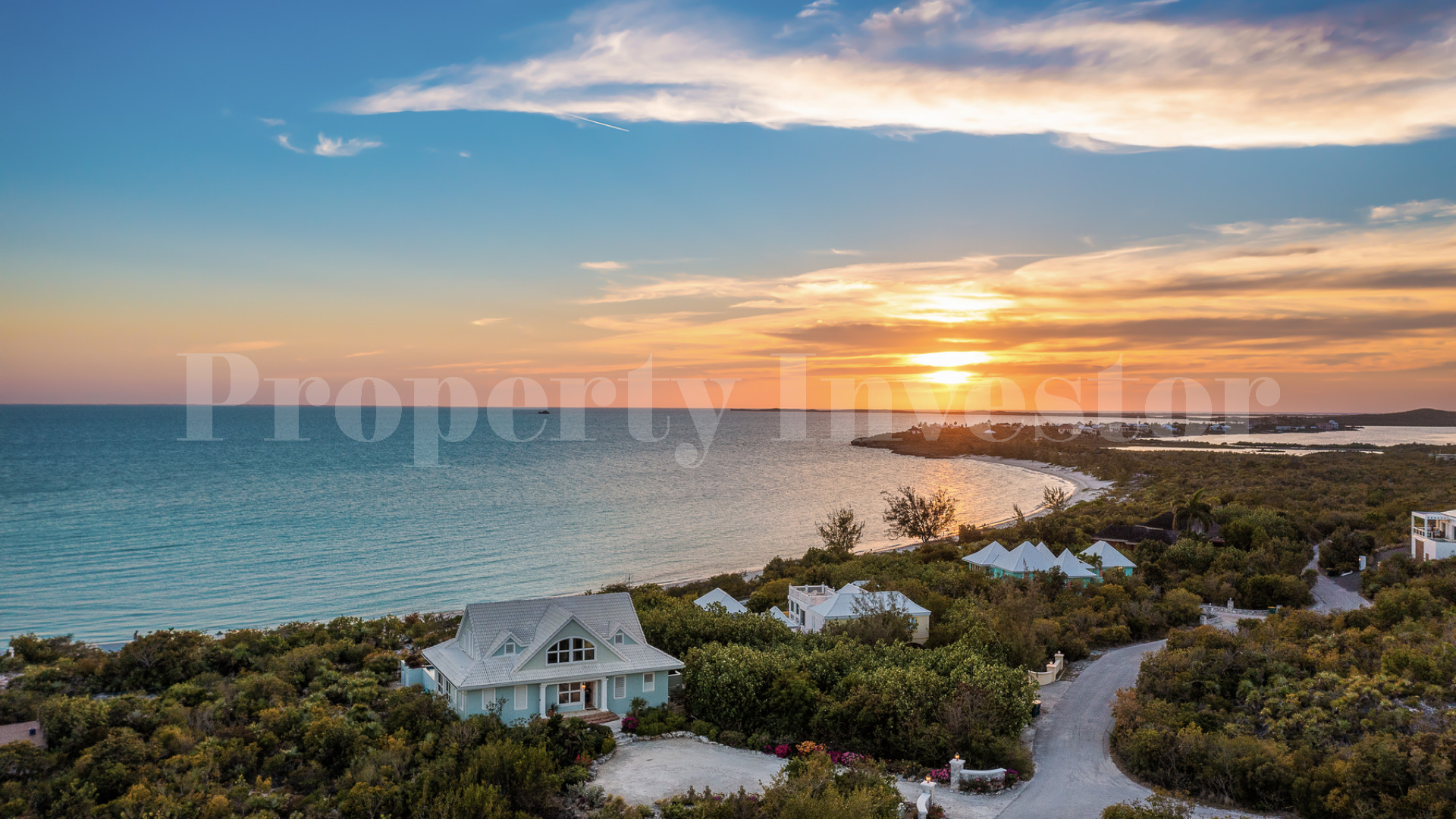 Fantastic 4 Bedroom Cape Cod Style Luxury Beach House for Sale  on Taylor Bay Beach, Turks & Caicos