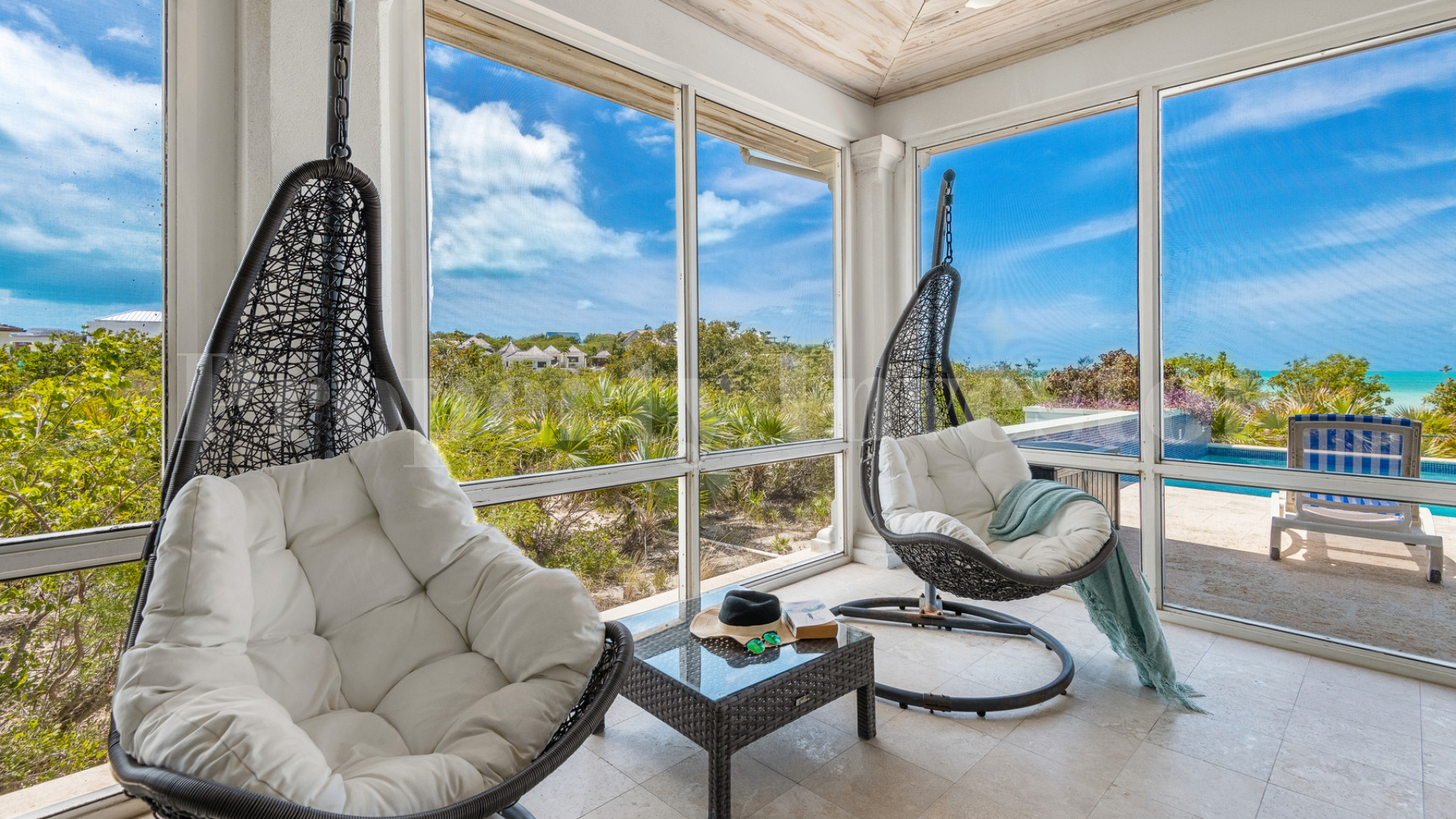 Fantastic 4 Bedroom Cape Cod Style Luxury Beach House for Sale  on Taylor Bay Beach, Turks & Caicos