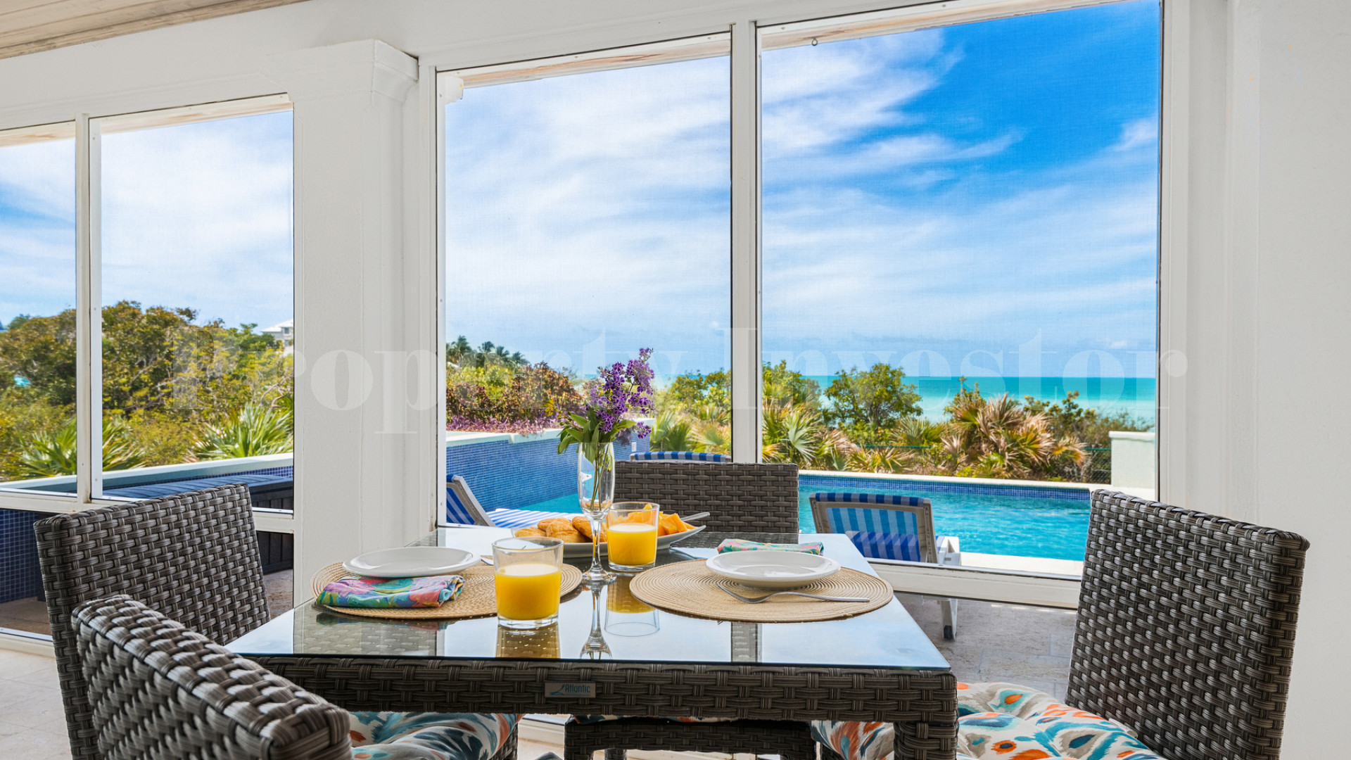 Fantastic 4 Bedroom Cape Cod Style Luxury Beach House for Sale  on Taylor Bay Beach, Turks & Caicos