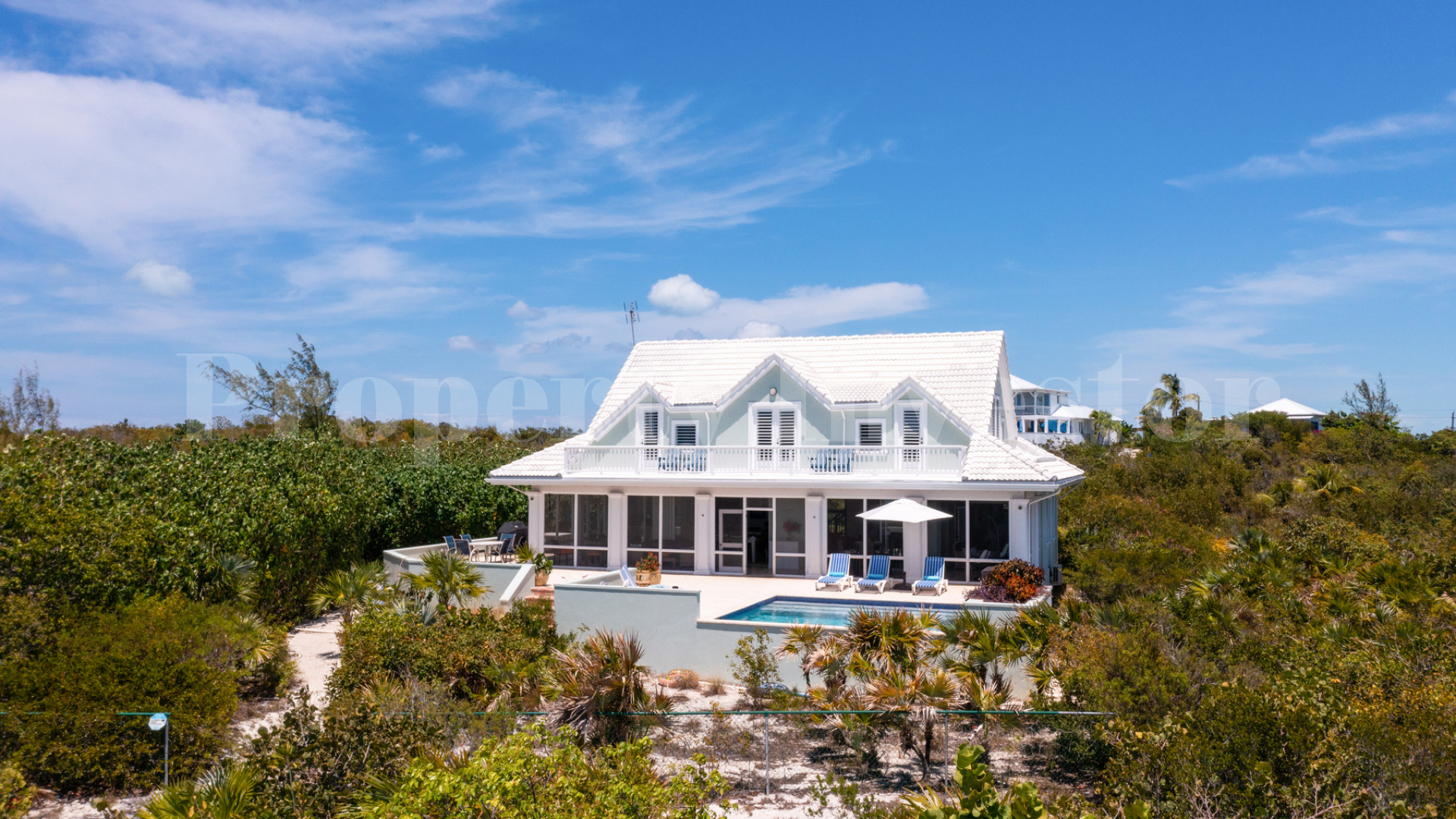 Fantastic 4 Bedroom Cape Cod Style Luxury Beach House for Sale  on Taylor Bay Beach, Turks & Caicos