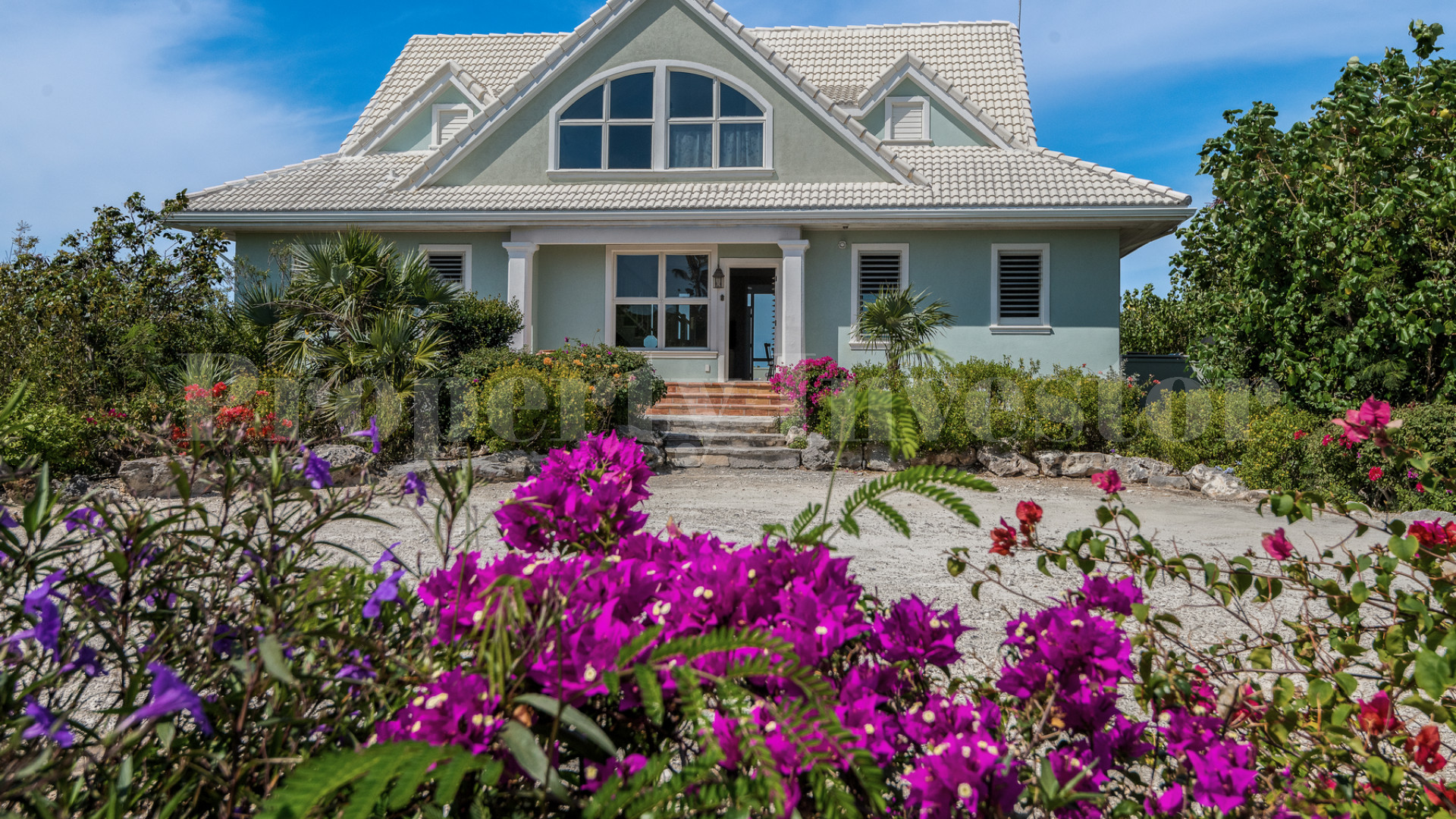 Fantastic 4 Bedroom Cape Cod Style Luxury Beach House for Sale  on Taylor Bay Beach, Turks & Caicos