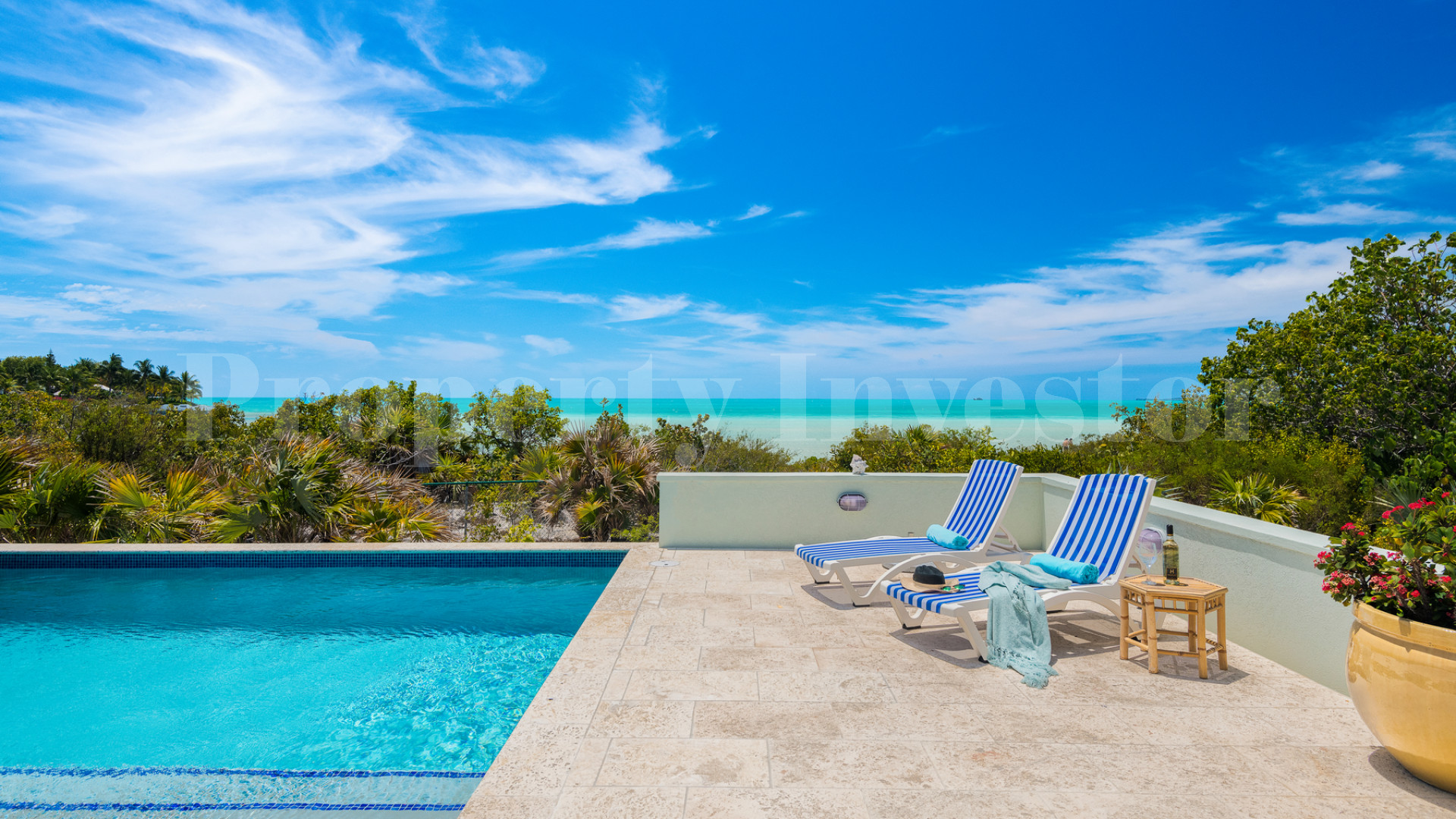 Fantastic 4 Bedroom Cape Cod Style Luxury Beach House for Sale  on Taylor Bay Beach, Turks & Caicos