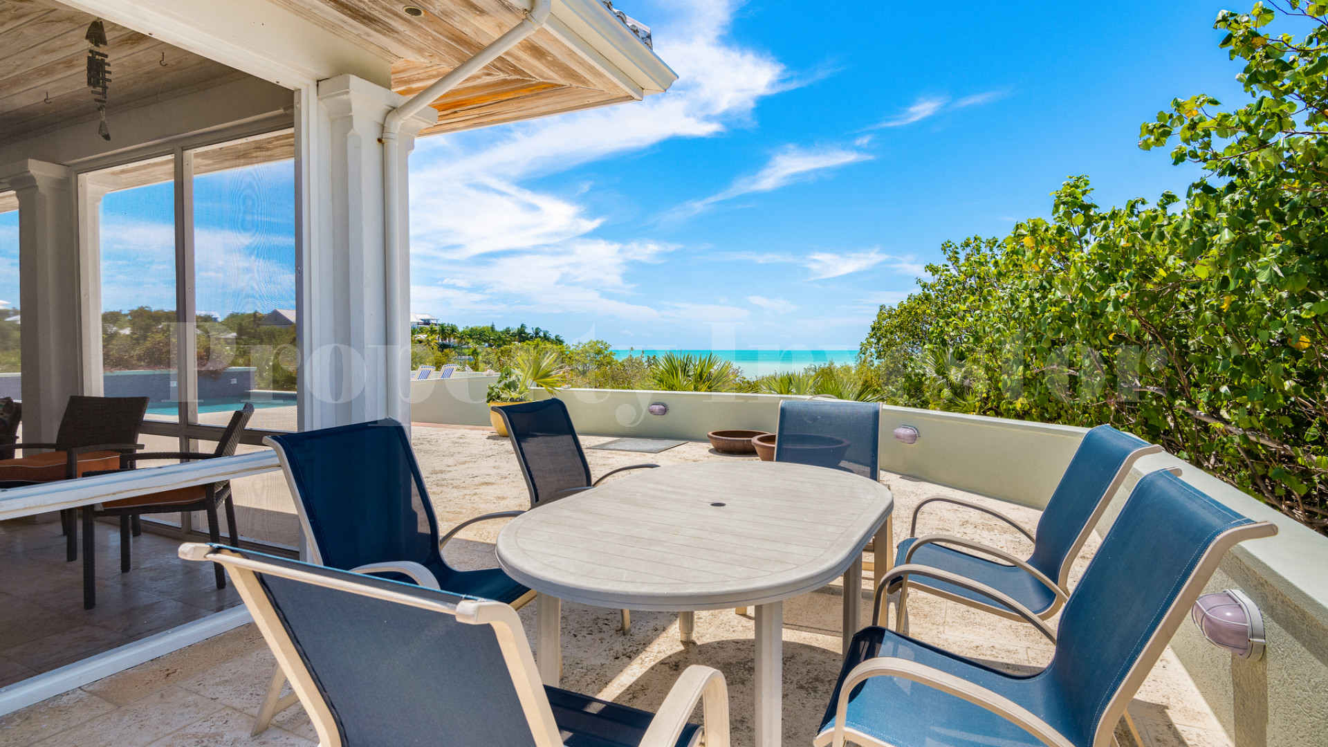 Fantastic 4 Bedroom Cape Cod Style Luxury Beach House for Sale  on Taylor Bay Beach, Turks & Caicos